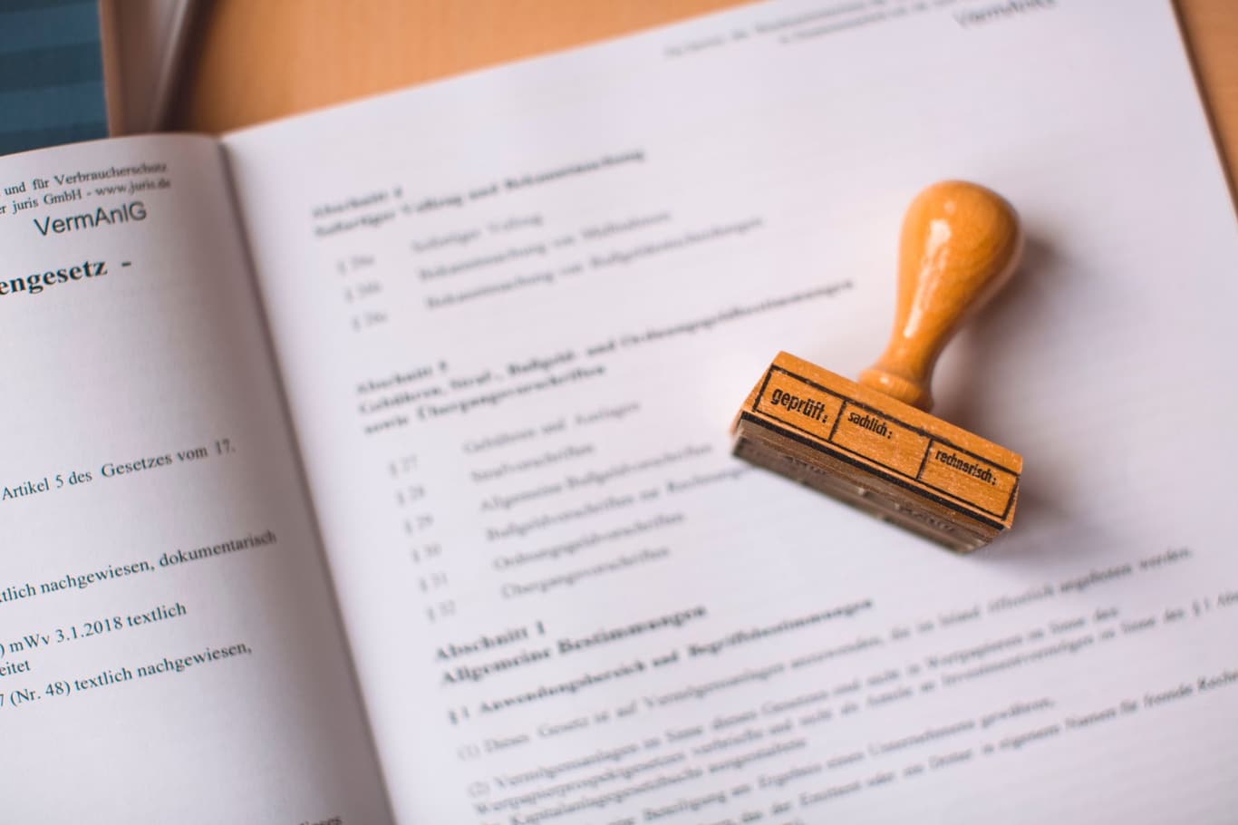 Banking compliance documents and regulatory paperwork on desk