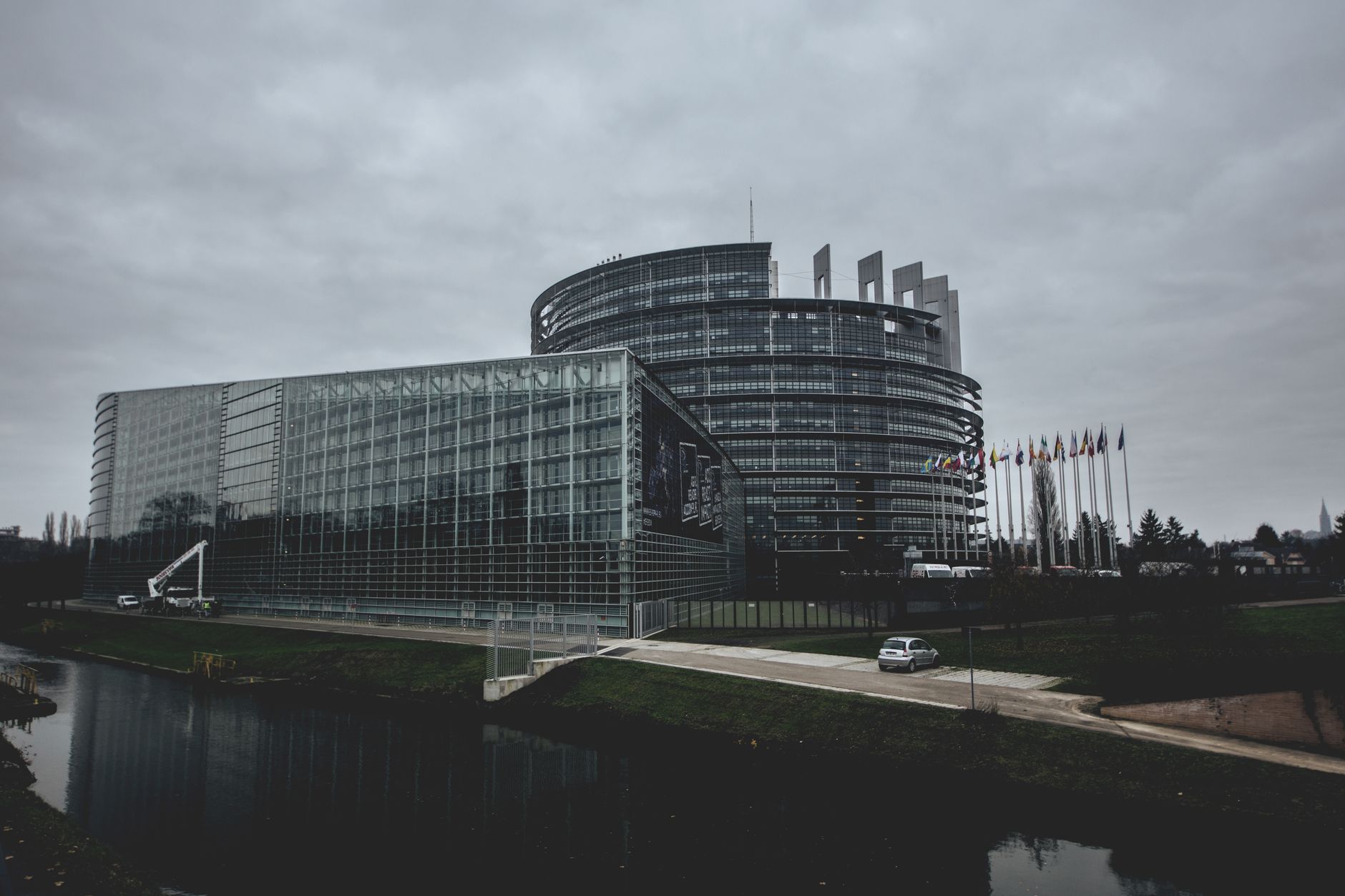 European flags in front of parliament building symbolizing EEA-wide regulatory recognition