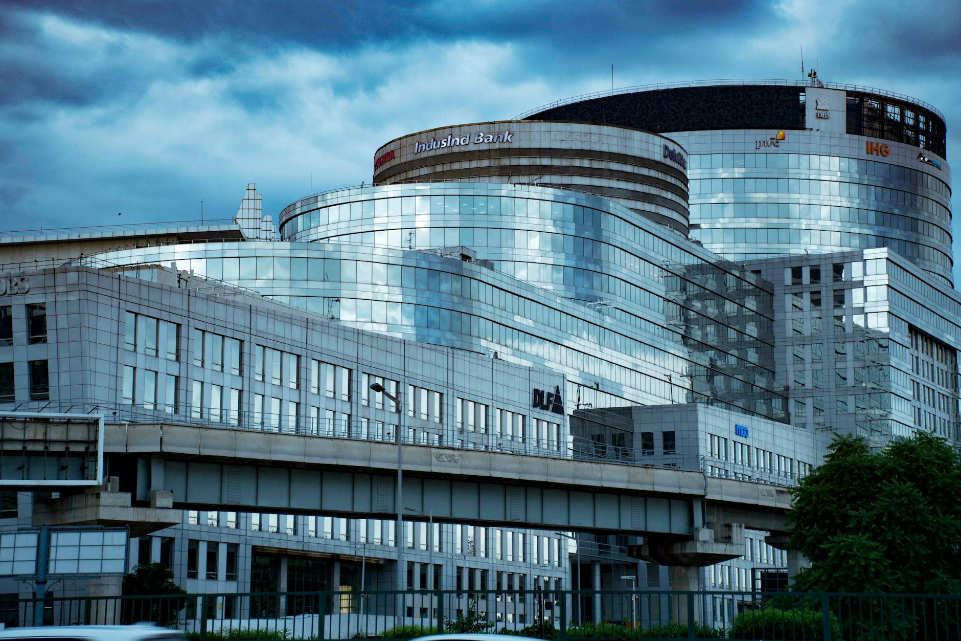 Modern glass-facade bank building representing traditional financial institutions