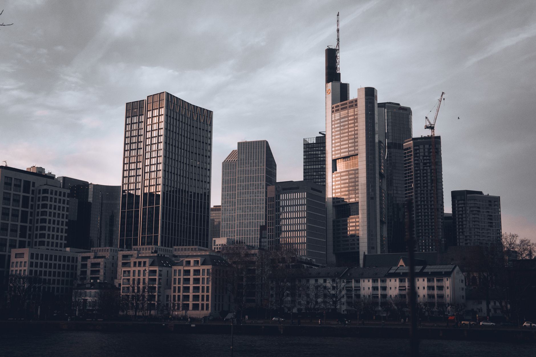 Glass skyscrapers in a European financial district under clear sky